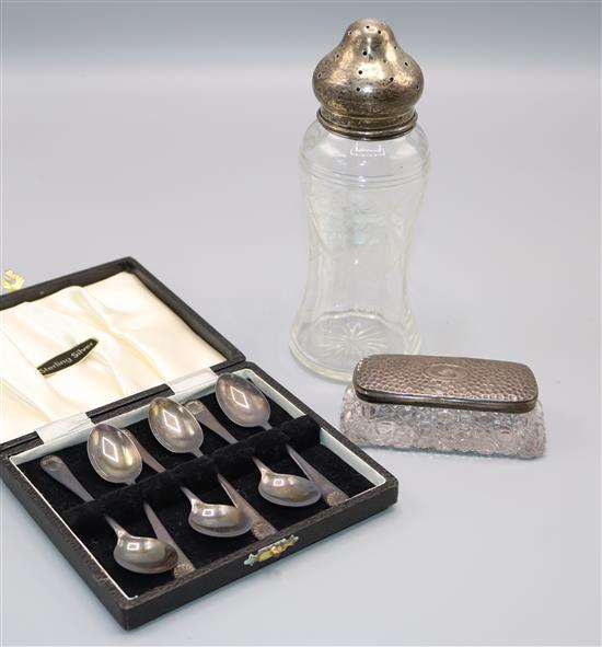 A cased set of 6 silver coffee spoons, a sugar sifter and ajar